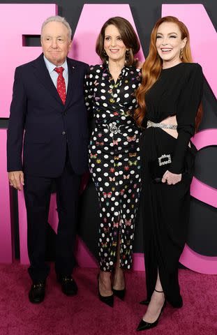 <p>Arturo Holmes/Getty</p> Lorne Michaels, Tina Fey and Lindsay Lohan at the "Mean Girls" premiere on Jan. 8, 2024