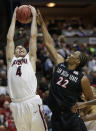 Arizona guard T.J. McConnell (4) rebounds next to San Diego State forward Josh Davis (22) during the first half of an NCAA men's college basketball tournament regional semifinal, Thursday, March 27, 2014, in Anaheim, Calif. (AP Photo/Jae C. Hong)