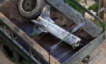 <p>A part of a missile is seen in a Lebanese army truck in Kawkaba, Lebanon, Feb. 10, 2018. (Photo: Ali Hashisho/Reuters) </p>