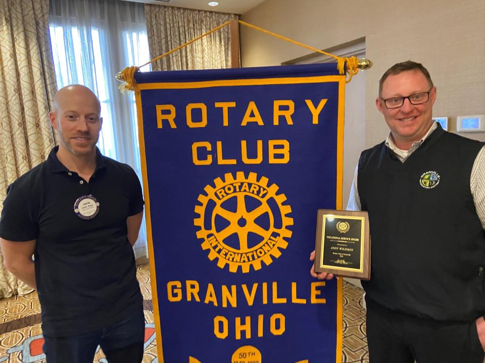 Vocational Service Award winner Andy Wildman (right) with Granville Rotary President Justin Biggs.