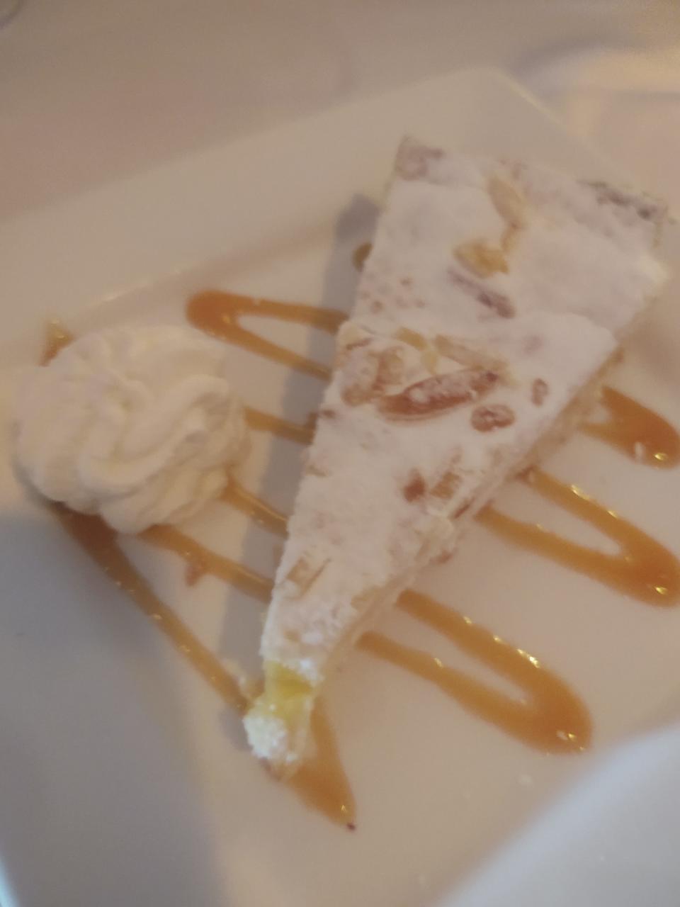 At Trattoria Dario in Vero Beach, the nonna cake has a layer of pastry, a layer of lemony filling and another layer of pastry with whipped cream and nuts.
