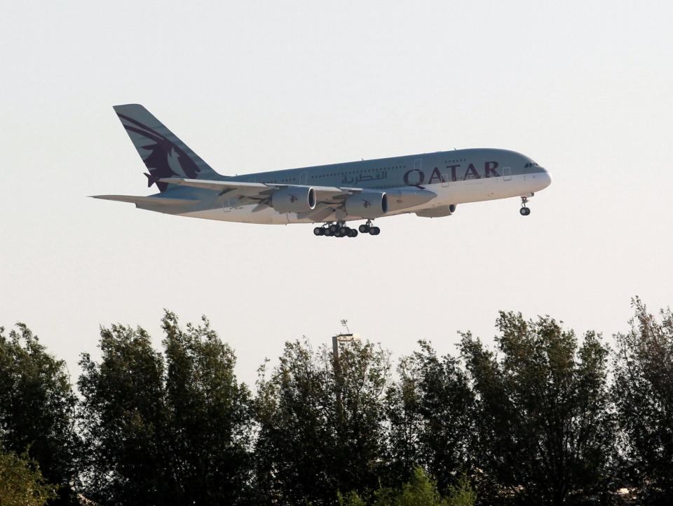 A Qatar Airways plane over Doha in Qatar (REUTERS)