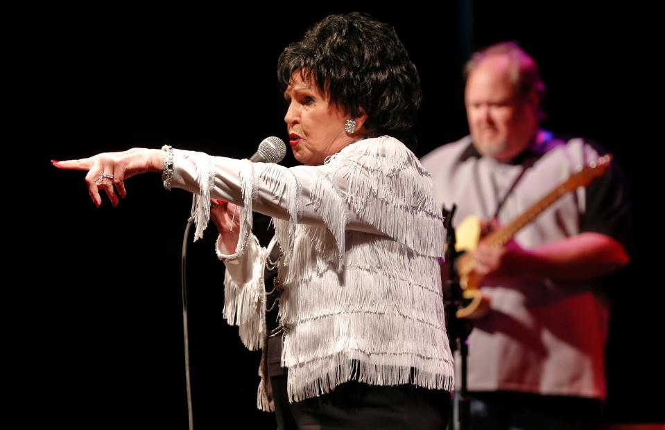 Wanda Jackson performs during the "Music4Moore" benefit concert in May 2013. The concert took place to benefit those affected by tornados that had hit the state.