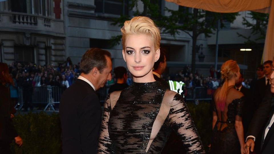 new york, ny may 06 anne hathaway attends the costume institute gala for the punk chaos to couture exhibition at the metropolitan museum of art on may 6, 2013 in new york city photo by larry busaccagetty images