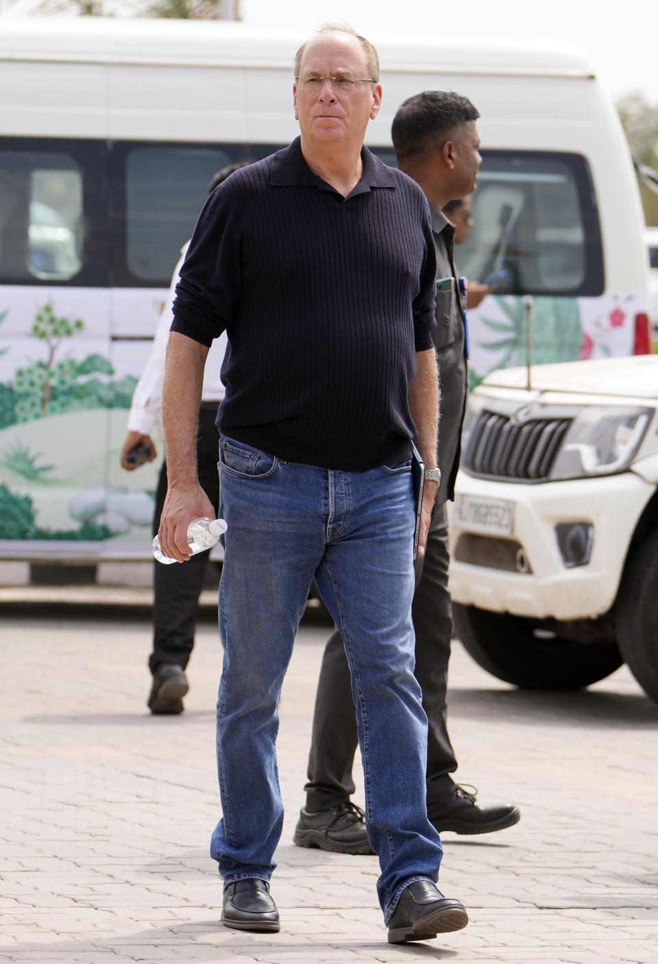 Larry Fink, chairman and CEO of BlackRock. arrives to attend a pre-wedding bash of billionaire industrialist Mukesh Ambani's son Anant Ambani, in Jamnagar, India, Friday, March 1, 2024. (AP Photo/Ajit Solanki)