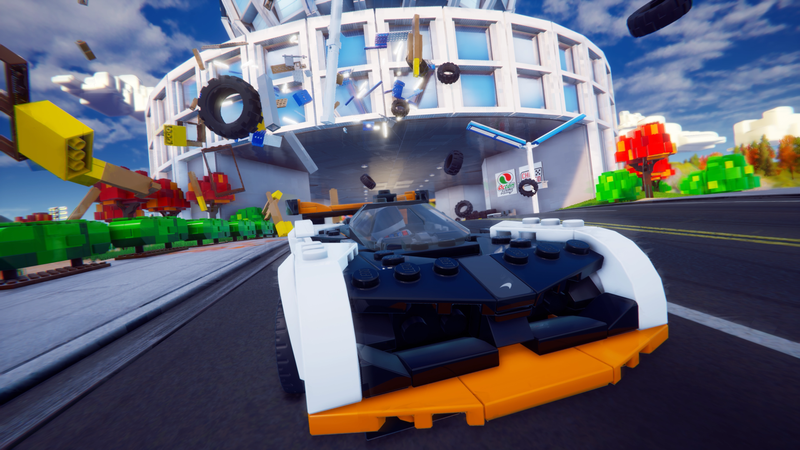 A promotional image of Lego 2K Drive featuring a McLaren Solus GT.