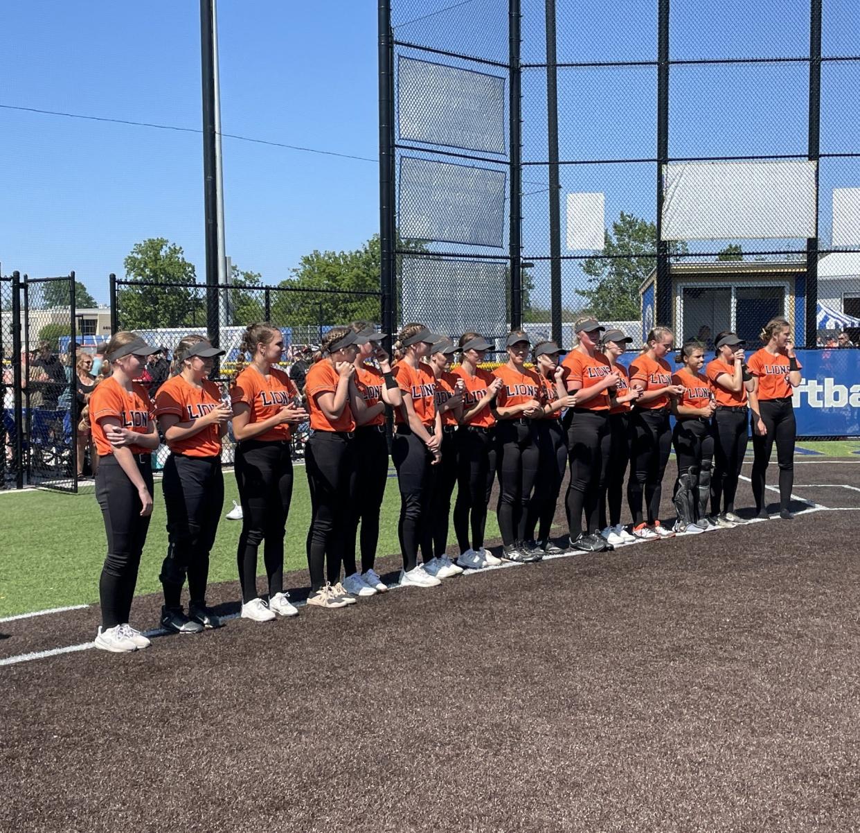 Wellsville awaits receiving the Class B region championship plaque.