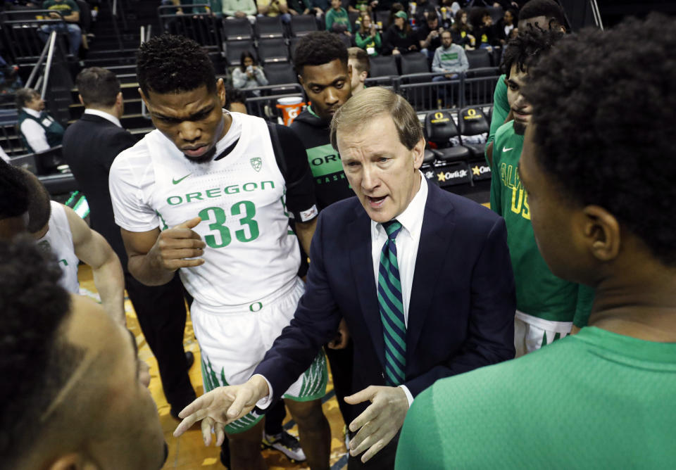 Oregon coach Dana Altman talks to his team before playing Alabama State in an NCAA college basketball game Sunday, Dec. 29, 2019, in Eugene, Ore. (AP Photo/Thomas Boyd)