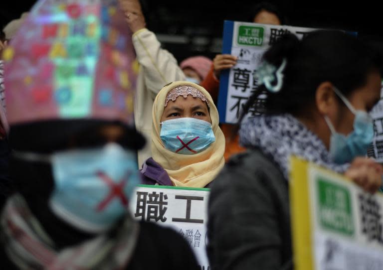 Foreign domestic helpers in Hong Kong protest against abuse in the workplace on March 3, 2013