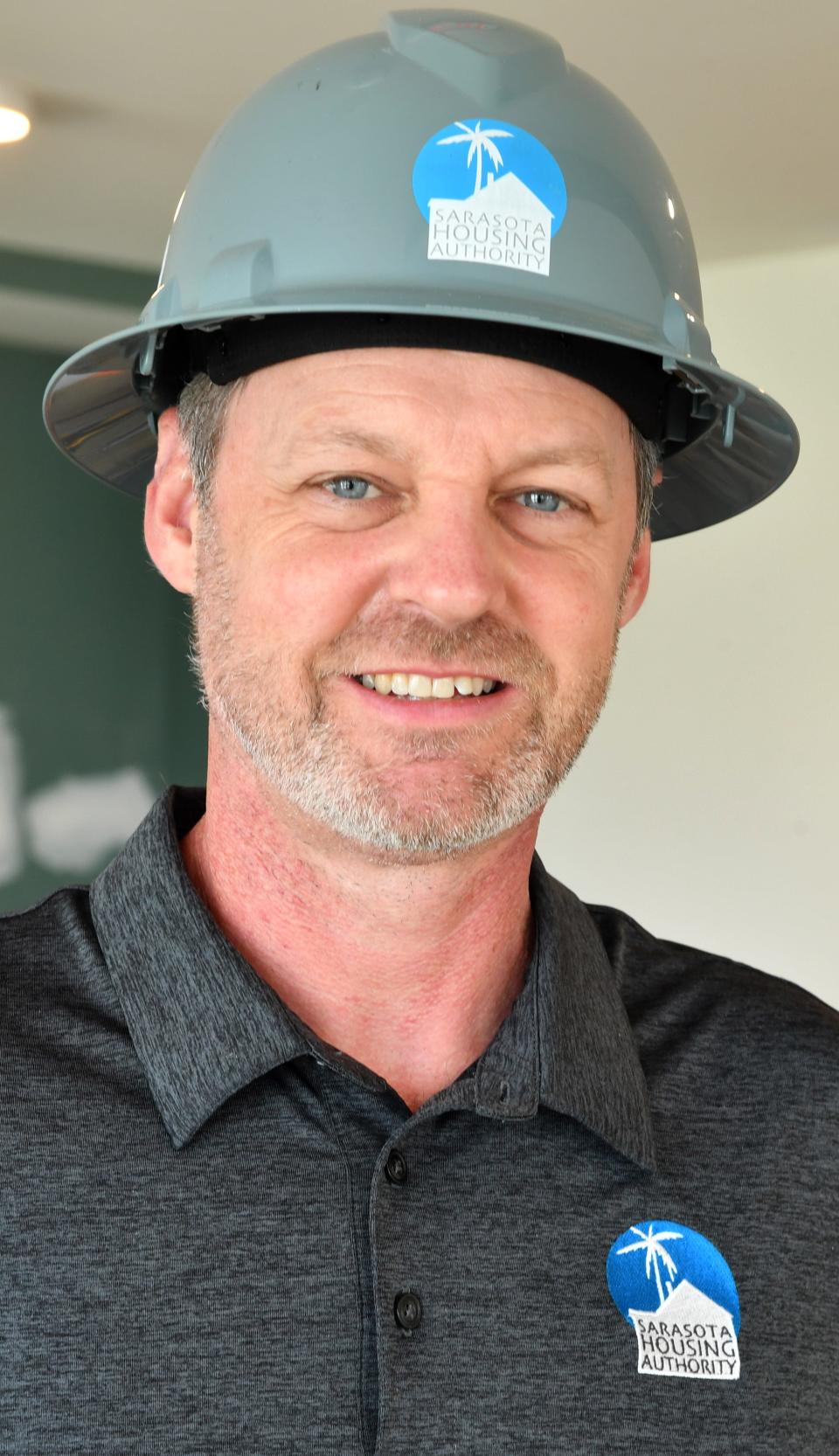 William Russell is CEO of the Sarasota Housing Authority. Russell posed for a photo during a recent tour of Lofts on Lemon.