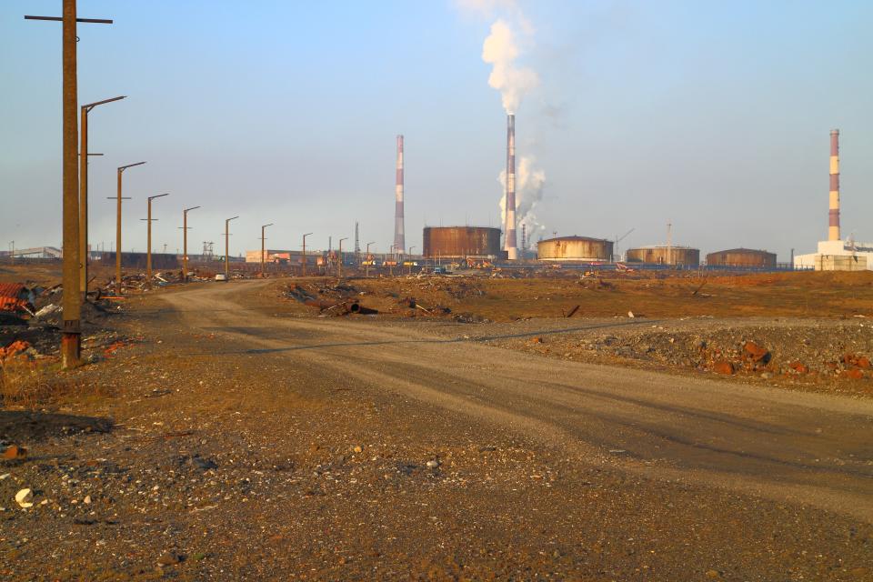 This handout photo provided by Vasiliy Ryabinin shows oil storage tanks outside Norilsk, 2,900 kilometers (1,800 miles) northeast of Moscow, Russia, Friday, May 29, 2020. Russian authorities have charged Vyacheslav Starostin, the director of an Arctic power plant that leaked 20,000 tons of diesel fuel into the ecologically fragile region on May 29, 2020, with violating environmental regulations. An investigation is ongoing into the alleged crime, that could bring five years in prison if Starostin is found guilty. (Vasiliy Ryabinin via AP)