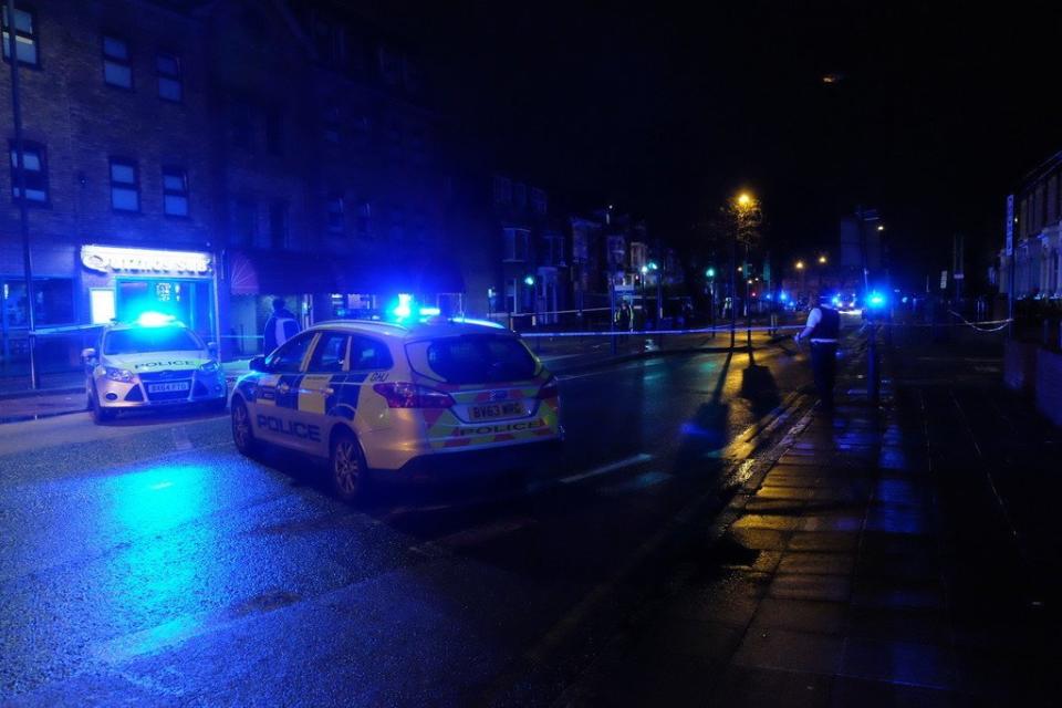 Police at the scene of a shooting in Stratford on Sunday night: James Cleveland