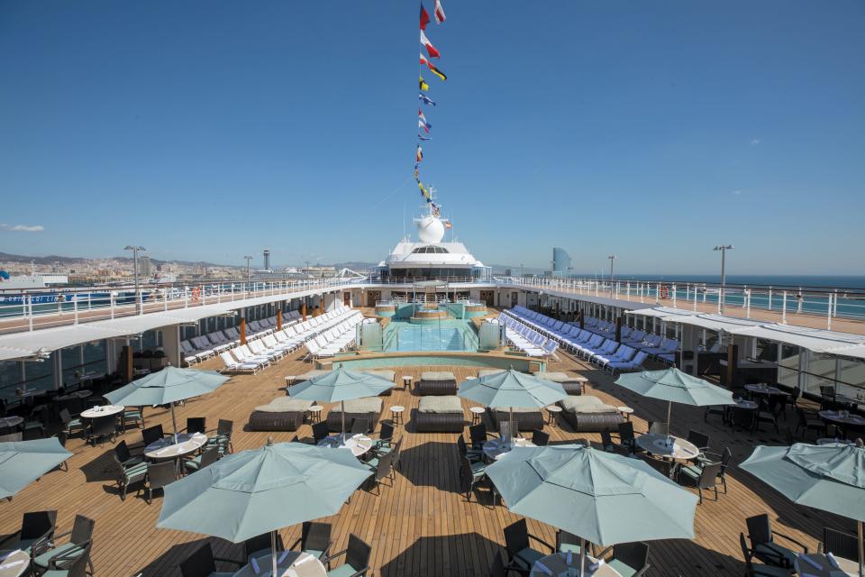 umbrellas and pool chairs on the pool deck