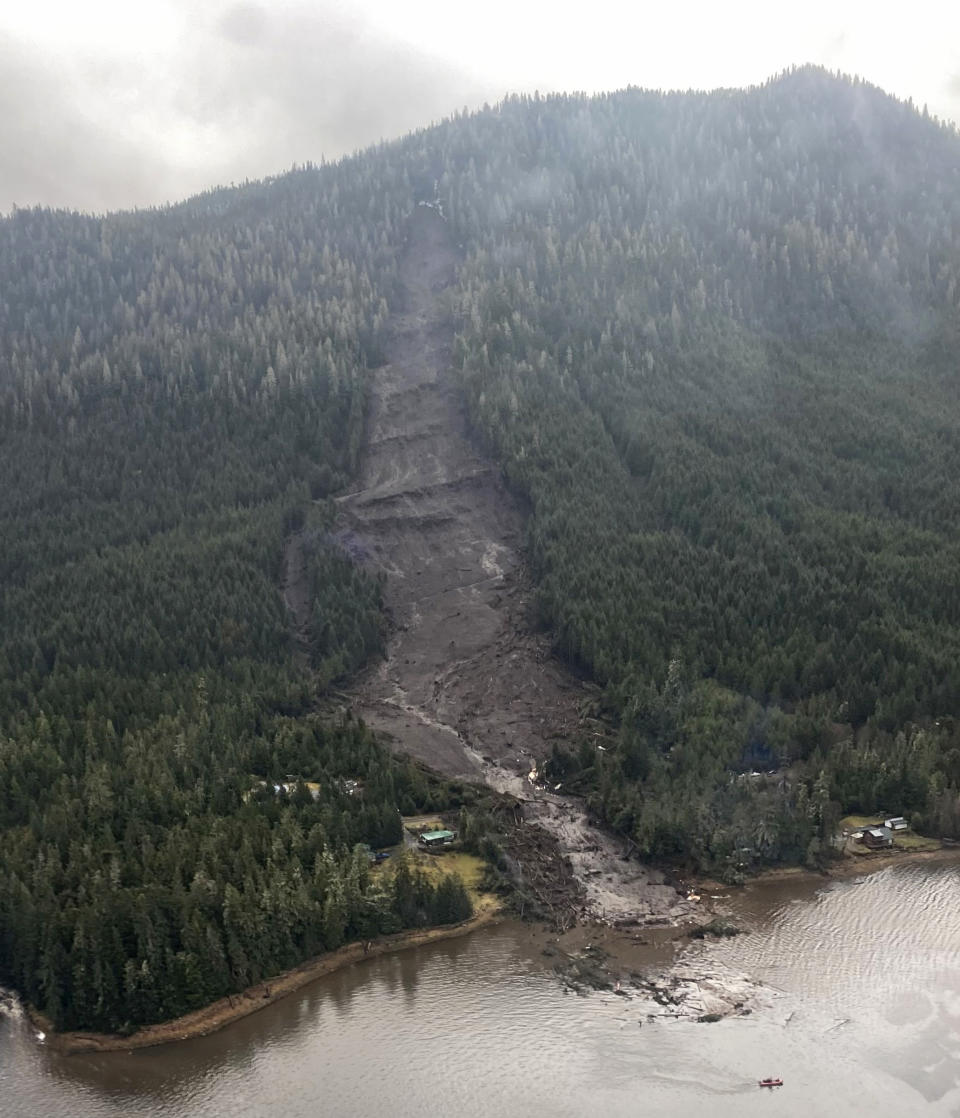 This photo provided by Sunrise Aviation shows the landslide that occurred the previous evening near Wrangell, Alaska, on Nov. 21, 2023. Authorities said at least one person died and others were believed missing after the large landslide roared down a mountaintop into the path of three homes. (Sunrise Aviation via AP)