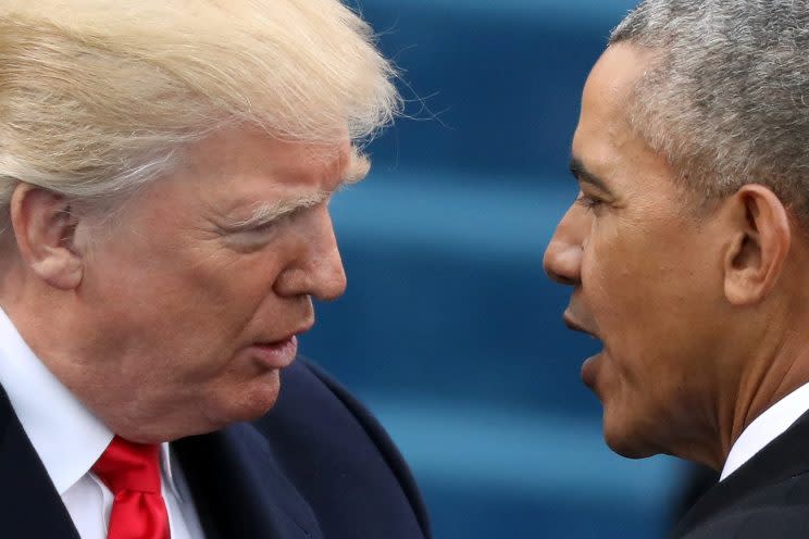 Obama greets Trump at Trump's presidential inauguration in Washington, D.C., in January. (Carlos Barria/Reuters)