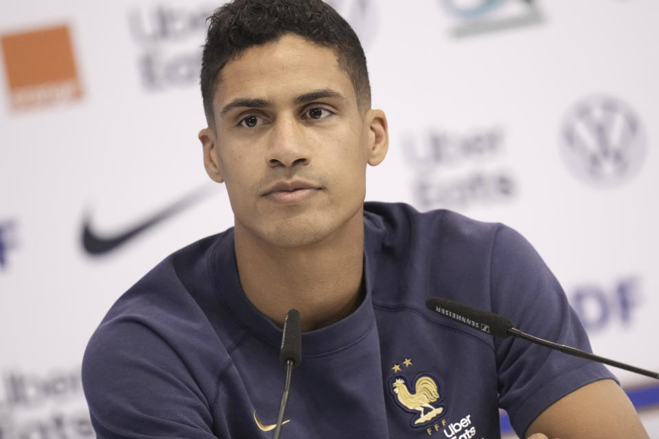 France's Raphael Varane answers questions during a press conference at the Jassim Bin Hamad stadium in Doha, Qatar, Monday, Dec. 12, 2022. France will play against Morocco during their World Cup semifinal soccer match on Dec. 14. (AP Photo/Christophe Ena)