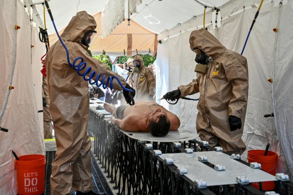 Members of Ukraine’s State Emergency Service attend nuclear disaster response drills amid shelling of Zaporizhzhia Nuclear Power Plant (REUTERS)