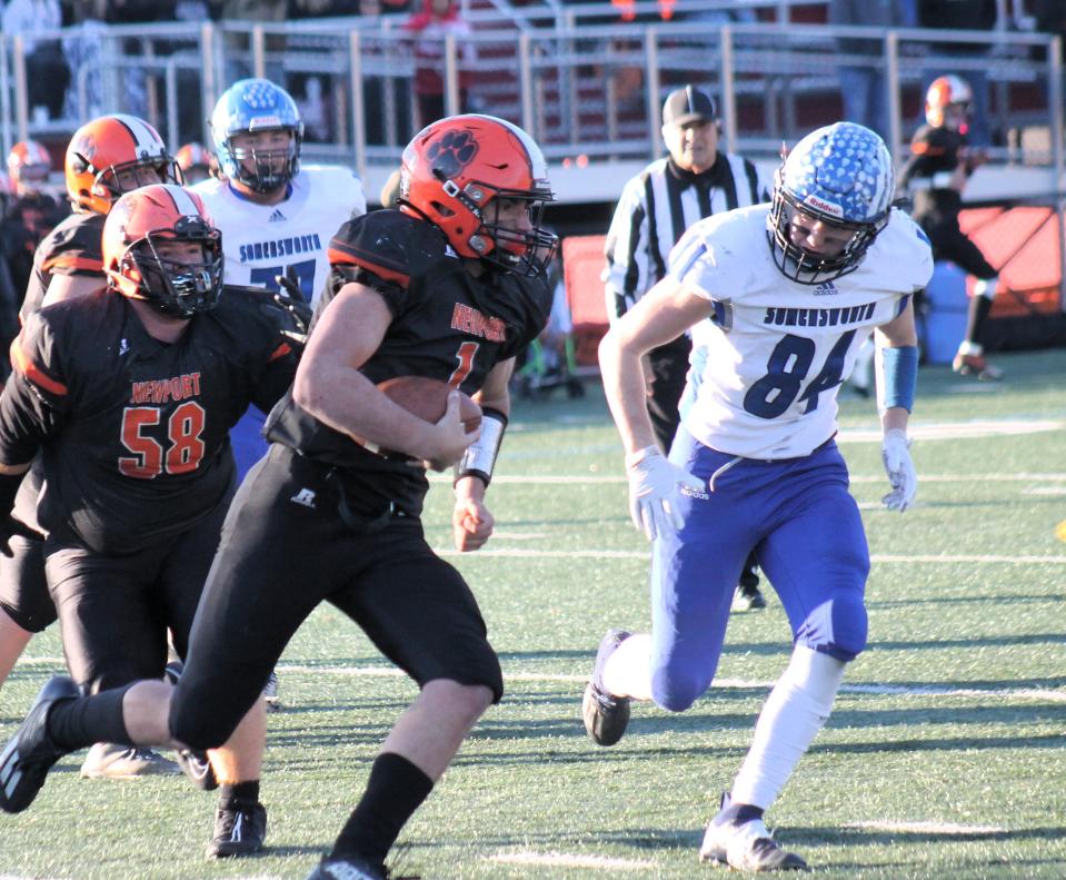 Somersworth's Jack Welch (84) has his sights set on Newport running back Kyle Ashley during Saturday's 21-7 win in the Division IV championship in Laconia.