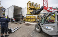 Military and personnel from the National Swedish Board of Health and Welfare dismantle a field hospital in Helsingborg, Sweden, Wednesday Sept. 9, 2020 after it was decided it was no longer needed. Sweden's relatively low-key approach to coronavirus lockdowns captured the world's attention when the pandemic first hit Europe. But it also had a per capita death rate much higher than other Nordic countries. Now, as infection numbers surge in much of Europe, Sweden has some of the lowest numbers of new cases and there are only 14 people being treated for the virus in intensive care in the country of 10 million. (AP Photo/TT News Agency/Johan Nilsson)