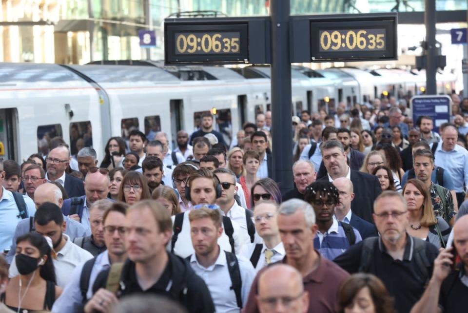 Passengers arrive at Kings Cross Station, London, as train services continue to be disrupted following the nationwide strike by members of the Rail, Maritime and Transport union along with London Underground workers in a bitter dispute over pay, jobs and conditions (PA)