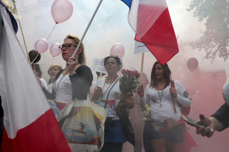 Some 200 angry wives of police officers held a protest near the Eiffel Tower in Paris, demanding better protection for their spouses while on duty