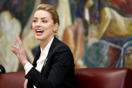 American actress Amber Heard speaks about her human rights experiences on the occasion of the 70th anniversary of the Universal Declaration of Human Rights at United Nations in Geneva, Switzerland, October 22, 2018. REUTERS/Pierre Albouy