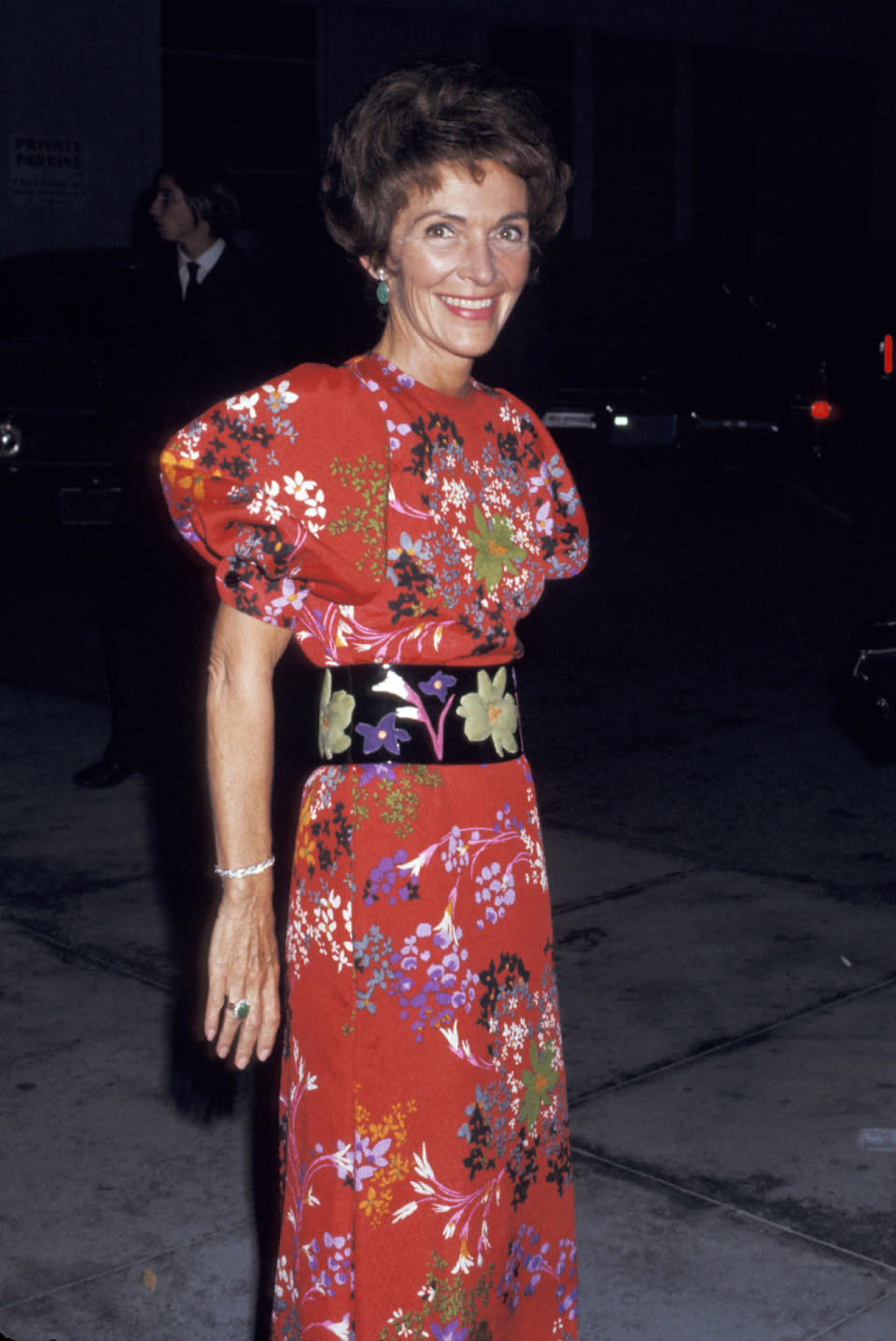 Nancy Reagan in a red floral dress in 1984