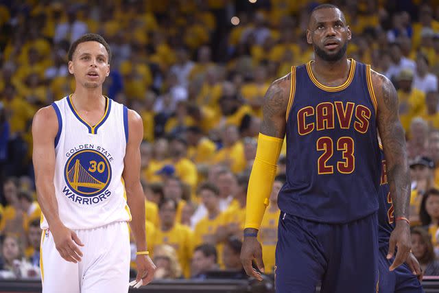 <p>John W. McDonough /Sports Illustrated via Getty</p> Steph Curry and LeBron James face off during the 2015 NBA Finals