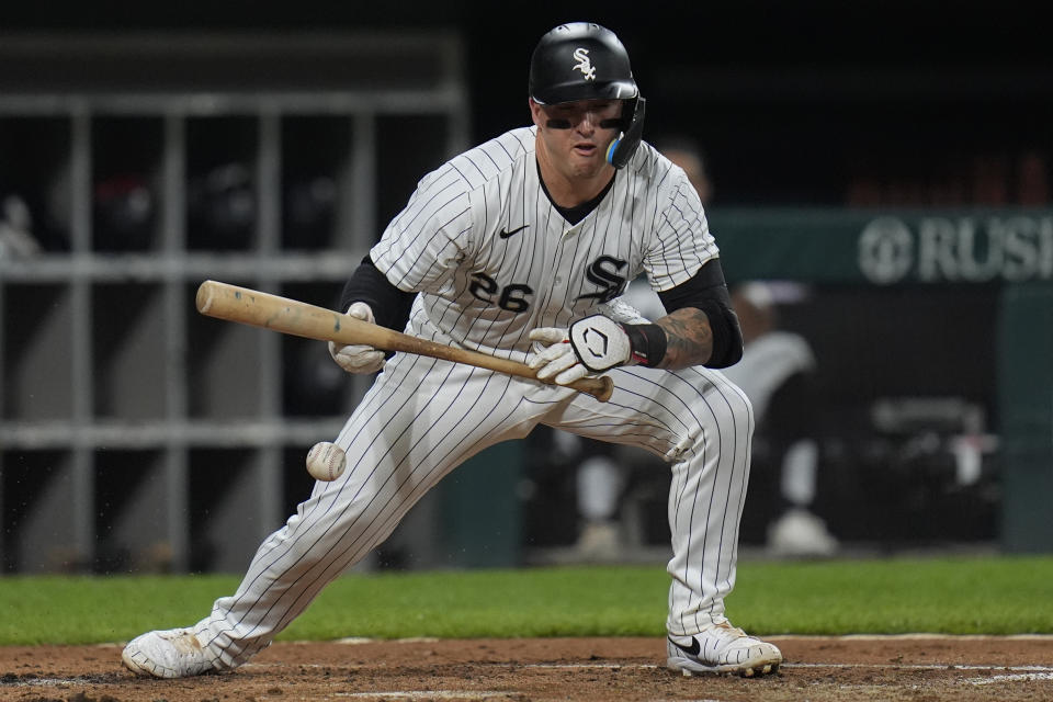 Chicago White Sox's Korey Lee attempts a bunt during the second inning of a baseball game against the Colorado Rockies, Friday, June 28, 2024, in Chicago. (AP Photo/Erin Hooley)