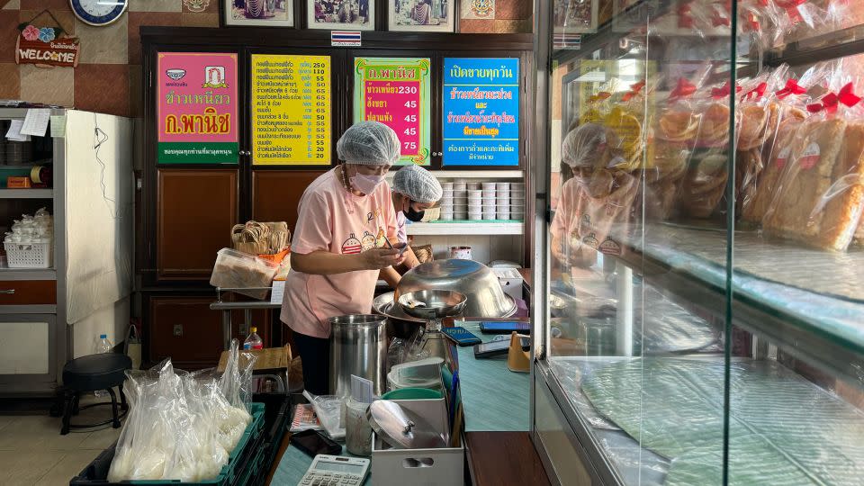 K Panich has been dishing out mango sticky rice since 1932. - Pongpat Patumsuwon