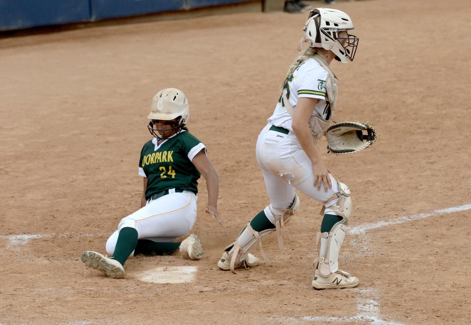 Moorpark's Driana Martinez sides into home plate to score a run against Temple City during the CIF-SS Division 4 championship game at Manning Stadium in Irvine on Friday, May 20, 2022. Moorpark lost 4-2.