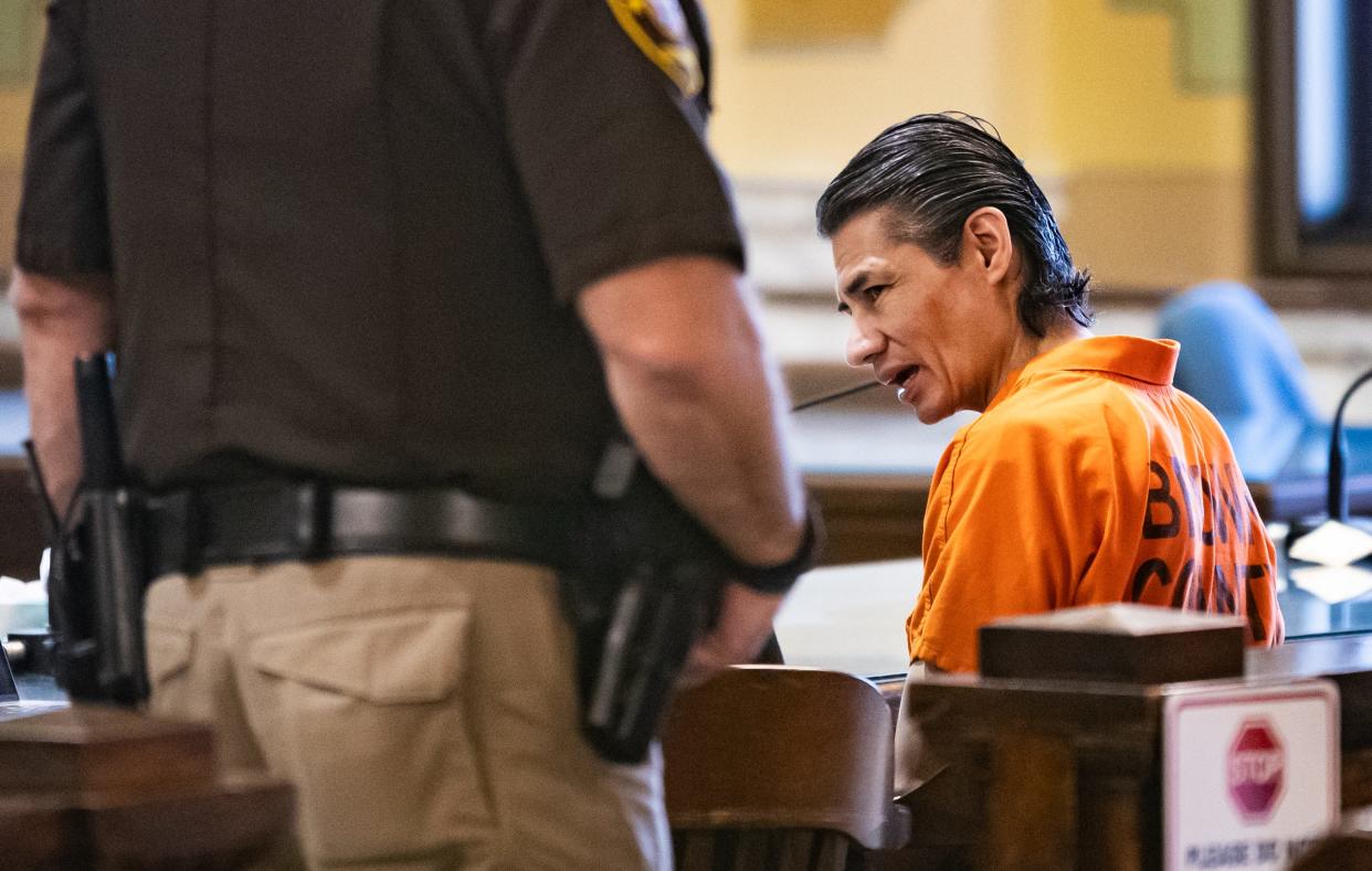 David Villareal, a former Green Bay School District teacher, speaks to his defense attorney after his sentencing for four counts of felony child sexual assault in the Brown County Courthouse on July 21, 2023, in Green Bay, Wis. Seeger Gray/USA TODAY NETWORK-Wisconsin