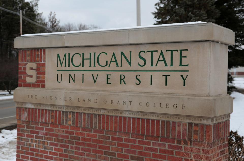 A sign for Michigan State University is seen near the campus in East Lansing.JPG