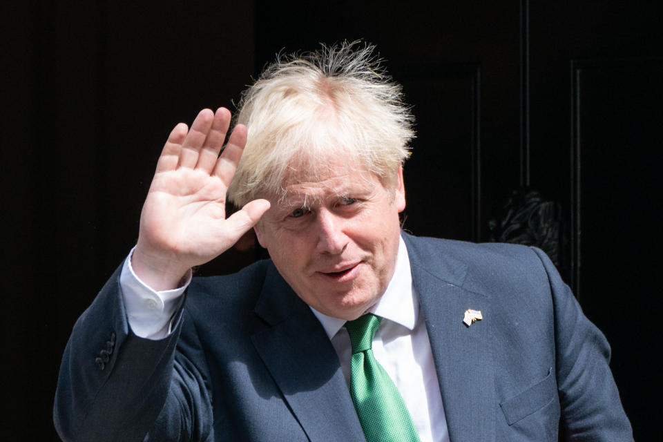 Boris Johnson waving