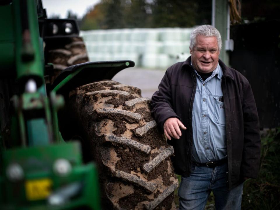 Farmer Bryce Rashleigh on the Saanichton Farm, which is celebrating 100 years of production. (Ken Mizokoshi/CBC - image credit)