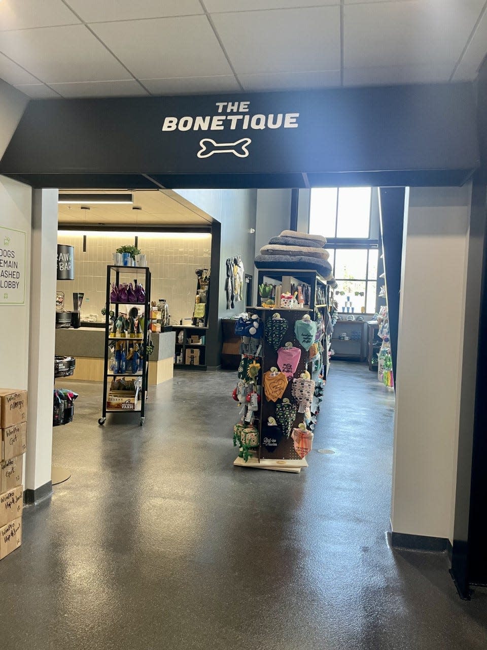 Members can receive 10% off at the Bonetique, the retail shop located inside Paws & Pints in Des Moines.