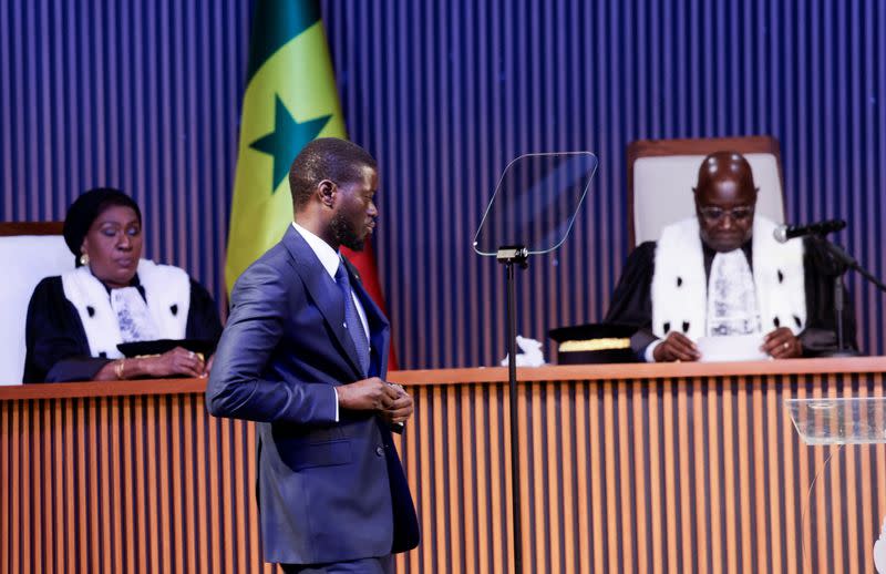 Senegal's Newly elected President Bassirou Diomaye Faye takes the oath of office as president during the inauguration ceremony in Dakar