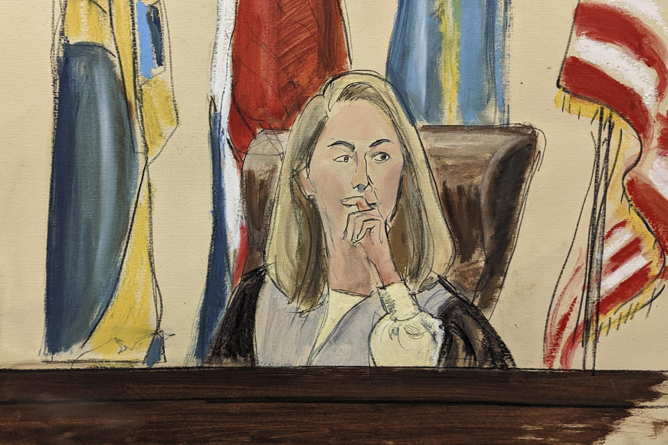 In this courtroom sketch, Supreme Court Chief Justice Kathleen McCormick listens to testimony in a courtroom in Wilmington, Delaware, Monday, Nov. 14, 2022, as Tesla shareholders challenge a compensation plan for CEO Elon Musk that could be worth more than $55 billion. (Elizabeth Williams via AP)