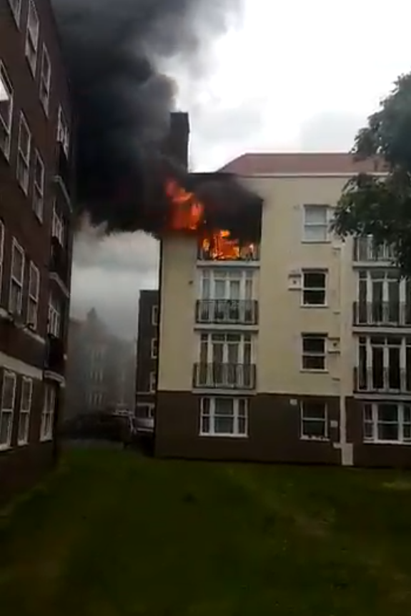 Fire: Smoke was seen billowing out of the windows of the building