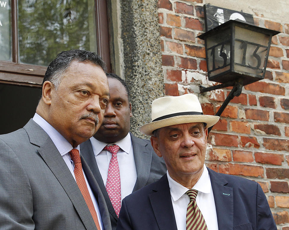 Rev. Jesse Jackson, left, and the head of Germany's Central Council of Sinti and Roma, Romani Rose visit the former Nazi death camp of Auschwitz-Birkenau in Oswiecim, Poland on Friday, Aug. 2, 2019. Rev. Jesse Jackson gathered Friday with survivors at the former Nazi death camp of Auschwitz-Birkenau to commemorate an often forgotten genocide — that of the Roma people. In addition to the 6 million Jews killed in camps such as Auschwitz, the Nazis killed other minorities during World War II, including between 250,000 and 500,000 Roma and Sinti. (AP Photo/Czarek Sokolowski)