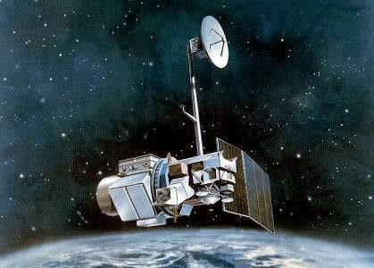 An artist's illustration of the Landsat 5 satellite in Earth orbit.