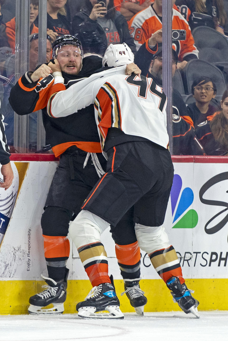 Philadelphia Flyers' Nicolas Deslauriers, left, gets into a fight with Anaheim Ducks' Ross Johnston, right, during the first period of an NHL hockey game, Saturday, Oct. 28, 2023, in Philadelphia. (AP Photo/Chris Szagola)