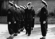 <p>A stern-looking Philip was in military mode while inspecting his troops in July 1947. Photo: Getty Images.</p> 