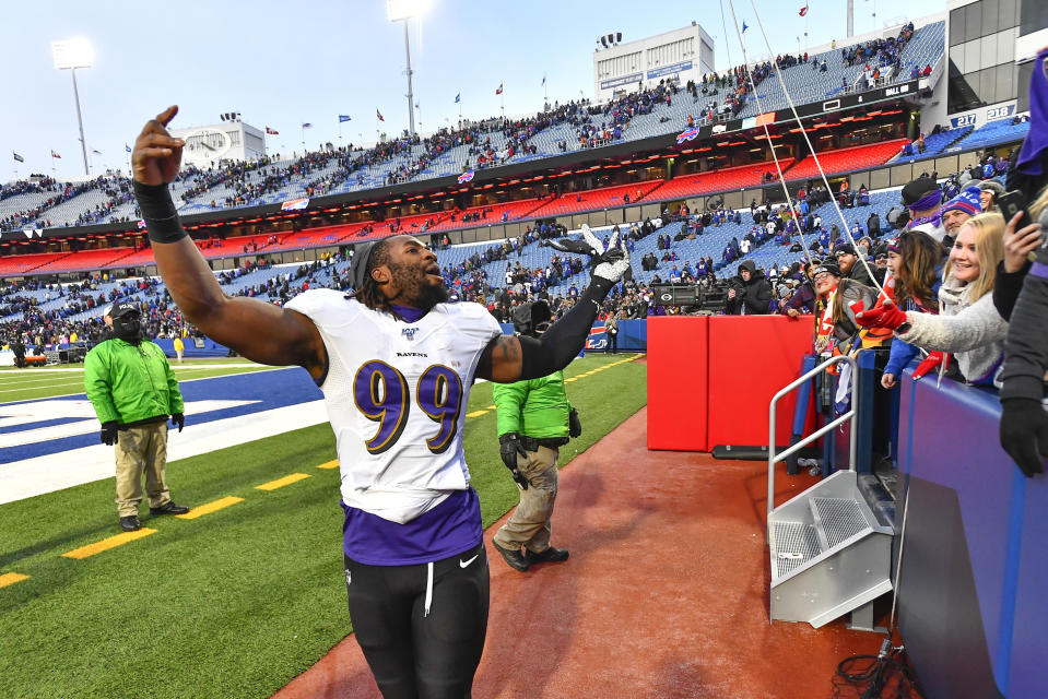 Baltimore Ravens outside linebacker Matt Judon (99) celebrates a 24-17 win over the Buffalo Bills after an NFL football game in Orchard Park, N.Y., Sunday, Dec. 8, 2019. (AP Photo/Adrian Kraus)