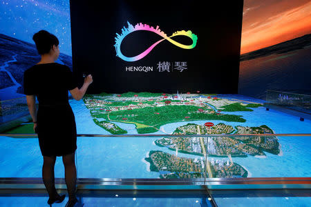 A layout of Hengqin under development is displayed inside a Government showroom at Hengqin Island adjacent to Macau, China September 13, 2017. REUTERS/Bobby Yip