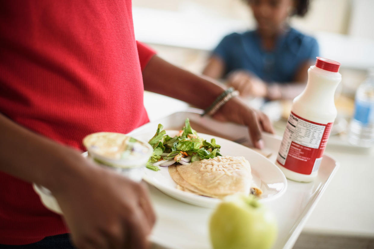 Students eating lunch in a school cafeteria Getty Images/JGI/Tom Grill