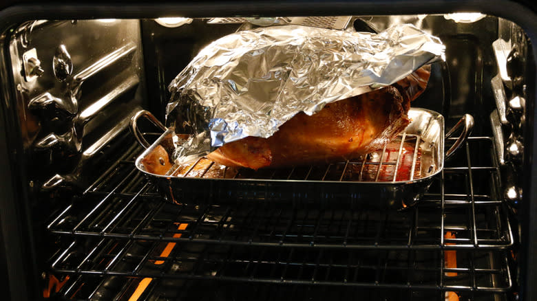 foil on turkey in oven