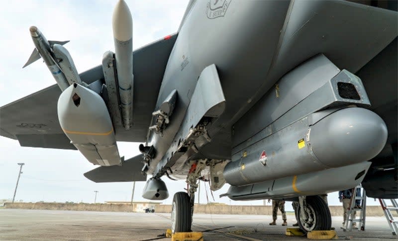 Stealthy AGM-158 JASSMs loaded onto an F-15E. JASSM uses an imaging infrared seeker — seen in the hexagon-shaped window on the missile's nose — to match the target in its databank and fine-tune its terminal attack run. (Photo by Airman 1st Class Susan Roberts)