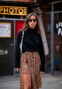 <p>Nina Urgell Cloquell wears a leopard print-skirt and black sweater at Arena Berlin on Aug. 31, 2018, in Berlin. (Photo: Christian Vierig/Getty Images for Zalando) </p>
