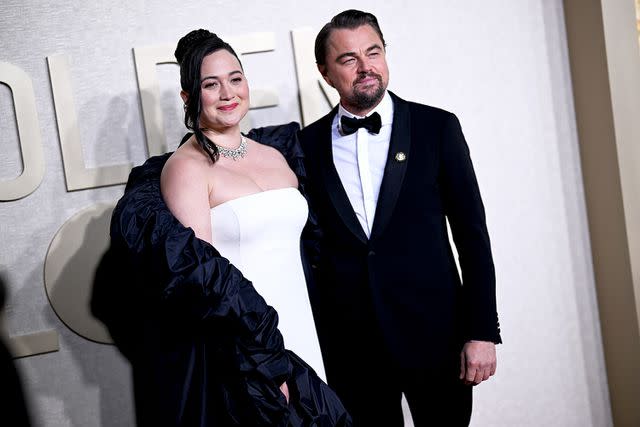 <p>Lionel Hahn/Getty</p> Lily Gladstone and Leonardo DiCaprio at the Golden Globes